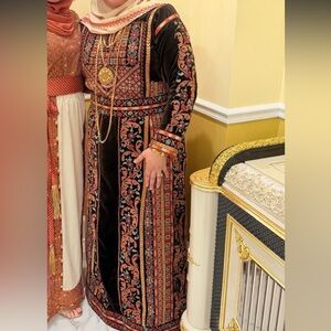 Traditional beautiful hand stitched thoube.